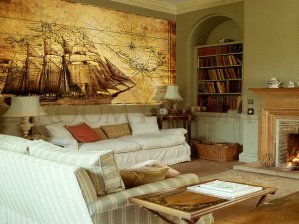 In the photo, mural depicting an old map and an old ship in the interior of the living room