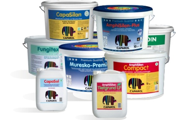 The photo shows a collection of facade and interior paints Kaparol