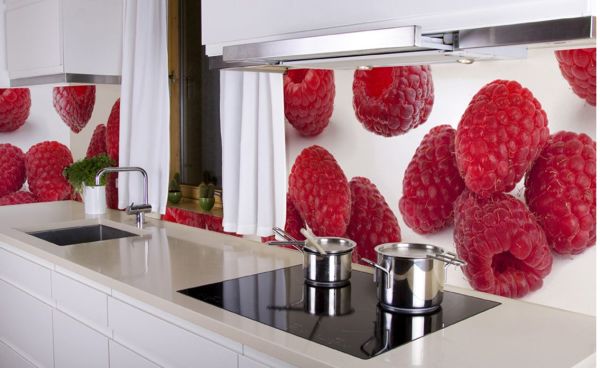 Wall mural with appetizing raspberries on a kitchen apron