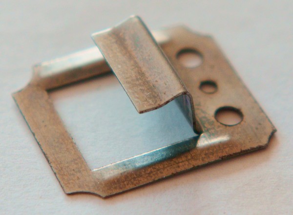 Metal clamp for lining