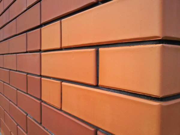 Photo. Ceramic walls in the hallway. Ceramic brick walls look neat and aesthetic