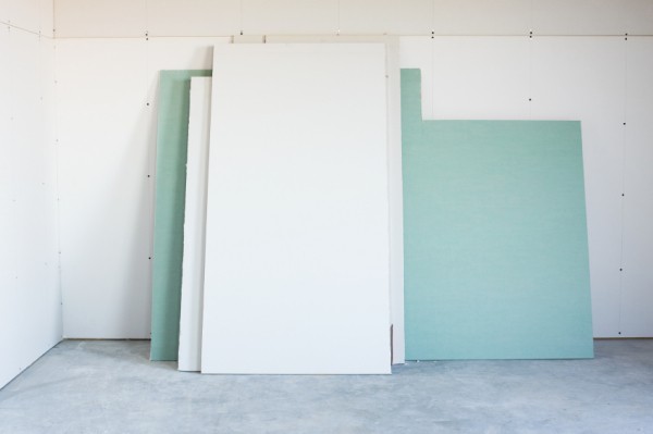 Drywall is not moisture resistant, so the walls must be additionally primed and treated with moisture repellents, so that subsequently the drywall does not bloom