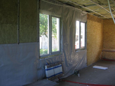 How to insulate the walls of a wooden house from the inside