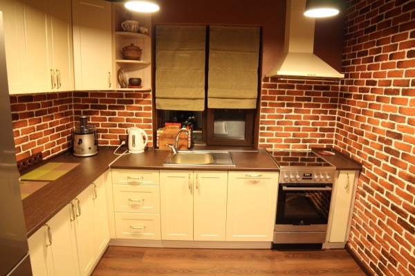 Brick wall decoration of the kitchen is suitable for some modern interior styles, but certainly not suitable for the classic design