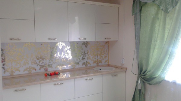 Plastic panels for decorating kitchen walls, this is a cheap and practical option