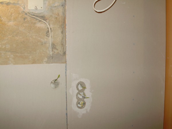 The process of directly pasting walls with drywall sheets, behind which you can easily hide the wires