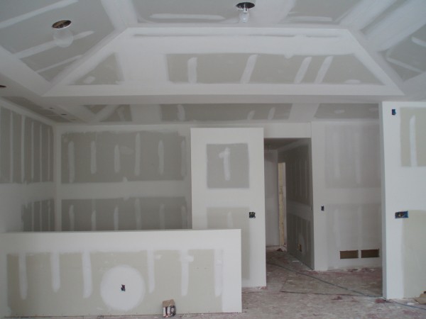 The walls sheathed with drywall become very smooth and any decorative finish can be used on them.