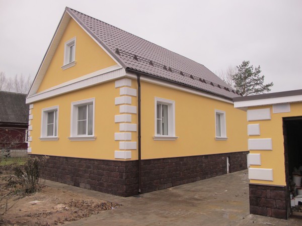 Colored whitewash of a plastered house