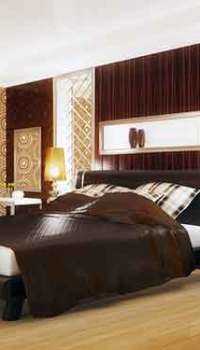 The large bedroom will be more comfortable with shades of brown