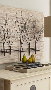 The wooden panel-ikebana can be simply in the form of branches decorated as small trees