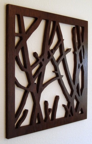 Wooden panels with carved unusual patterns will become a worthy decoration of any wall