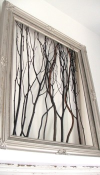 And even simple branches, collected in a noble frame, will create a mood and decorate the house.