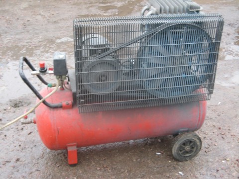 Compressor with a makeshift protective grill