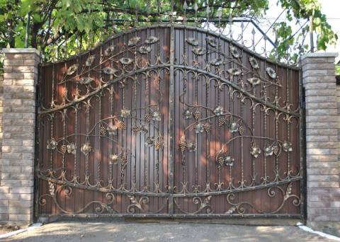 Handmade forged gates painted with blacksmith paint