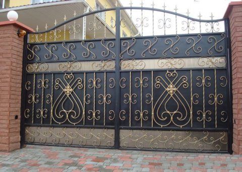 In the photo, metal gates painted black