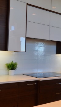 Wall decoration over the kitchen worktop with plastic panels