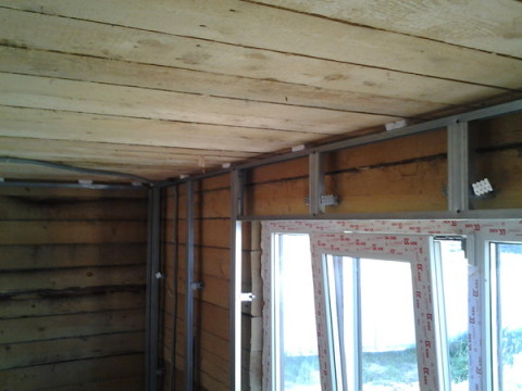 With the help of drywall sheets, you can easily level and insulate the walls in your wooden house