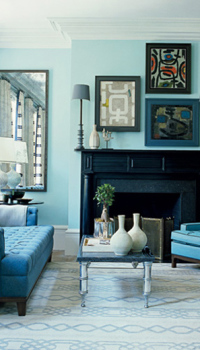 The combination of the blue color of the living room with blue furniture