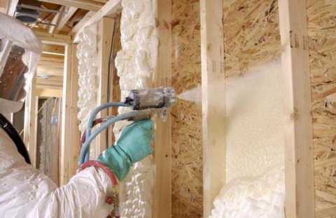 We see an example of applying polyurethane to wooden walls.