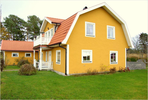 Painting a house with cement paint