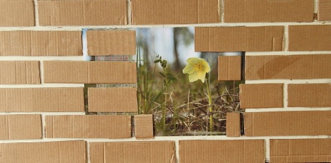 Using corrugated board to simulate a brick