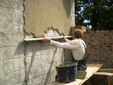 Application of cement-sand plaster.