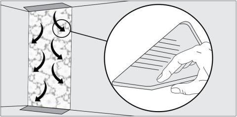 The scheme of smoothing wallpaper with a plastic spatula.