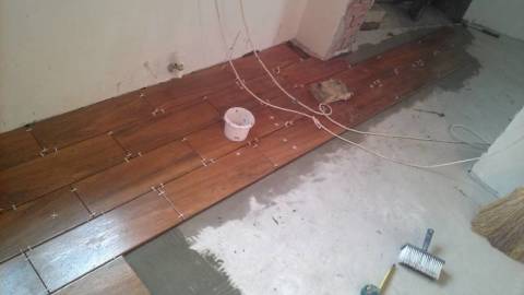 Laying tiles on the floor