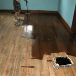 Painting the wooden floor makes it well-groomed and visually perfectly flat.