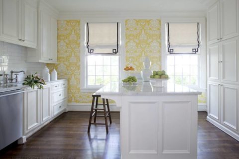 Accent wall in the interior of the kitchen, pasted over with non-woven wallpaper