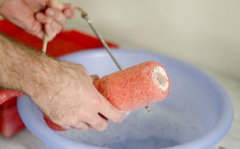 Rinse the roller coat after applying each coat