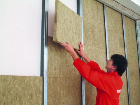 Filling the partition with sound absorbing material