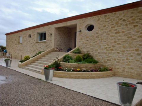 Decoration of the facade with stone plaster