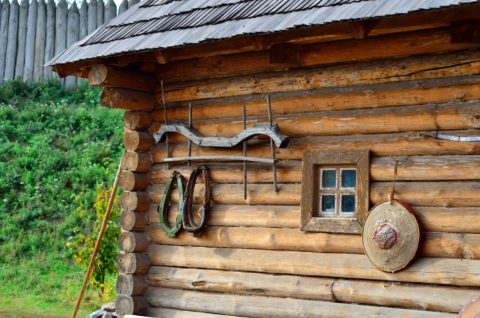 Wooden wall in a rustic house made of logs