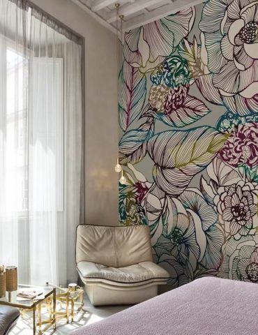 Wall mural with a large pattern in the bedroom with a high ceiling