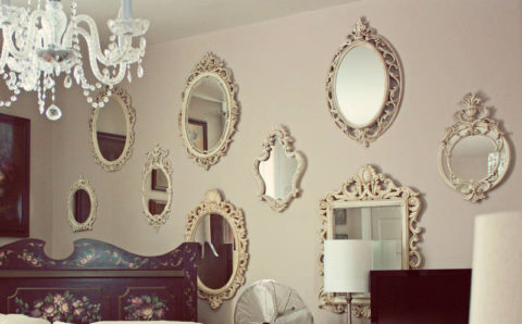 Several mirrors in a beautiful framework for a classic interior