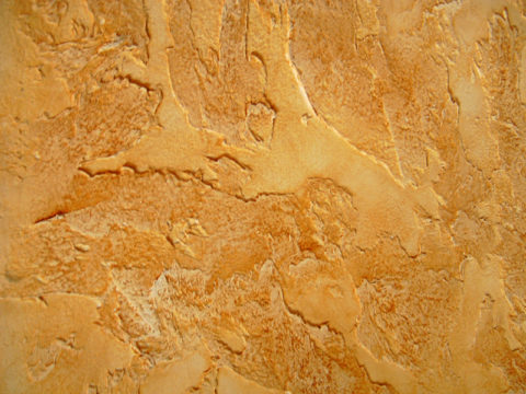 Execution of stone plaster - embossed decorative surface