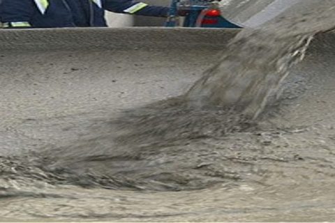 Pouring concrete into the mold