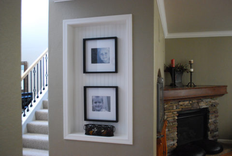 Decorative niche decorated with photos from the family archive